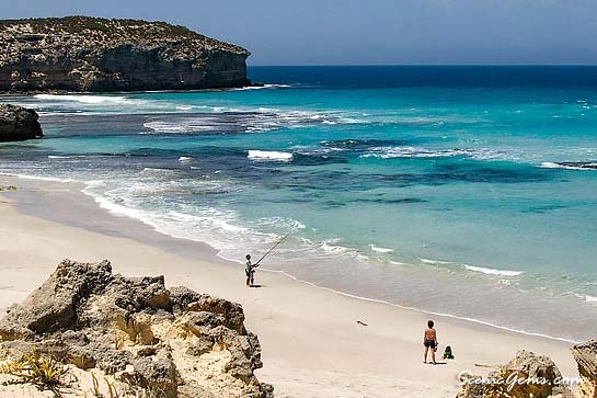 Man beach fishing at Pennington Bay, Kangaroo Island, South Australia.