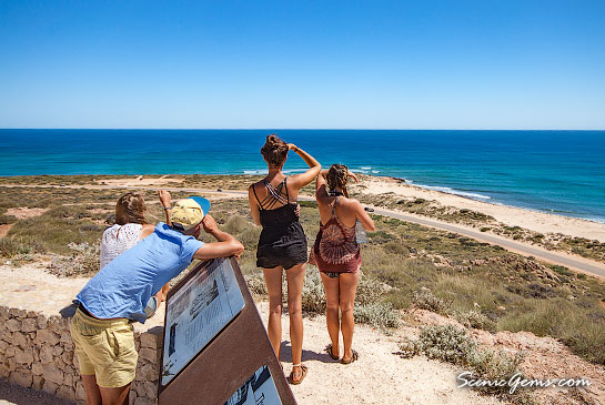 Travellers whale watching at Vlamingh Head Lookout, Exmouth, Western Australia
