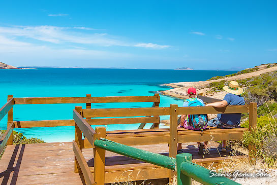 Couple enjoying the view of Blue Haven Beach, Esperance, from the top of the staircase leading down to the beach