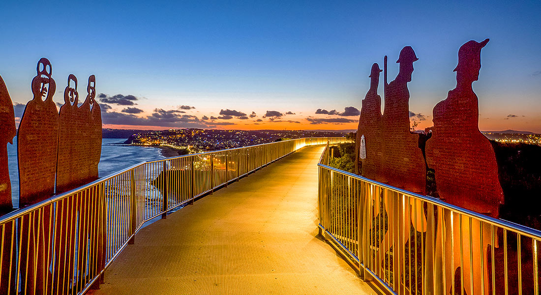 Dusk at the Anzac Memorial Walk, with the footbridge lights turned on. Newcastle, NSW, Australia