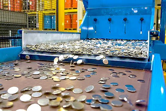 Coin embossing machine at the Royal Australian Mint, Canberra, ACT, Australia