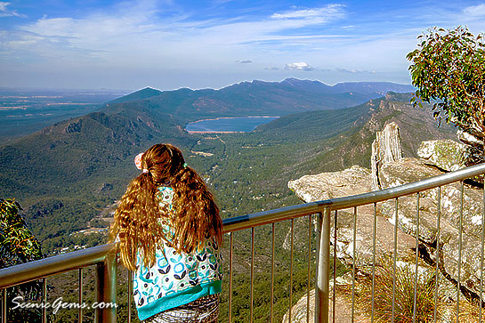 Young girl taking in views from Boroka Lookout, Grampians National Park, Victoria, Australia